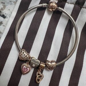 Pandora sterling silver & rose gold bangle. Bracelet needs to be cleaned.